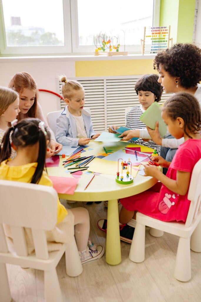 Children engaged in creative activities during an art class at a preschool, fostering learning and fun.